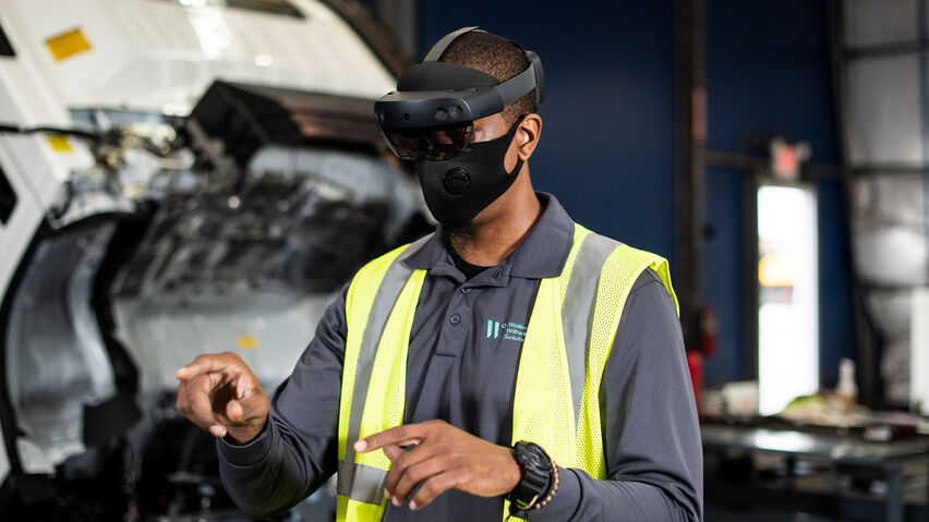 Vehicle processing employee uses Microsoft HoloLens technology