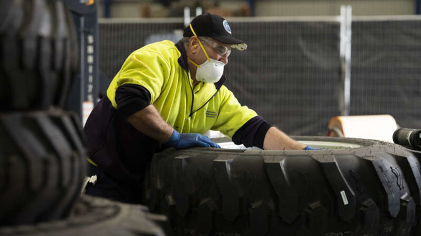 EPC worker checking tyres EPC worker checking tyres