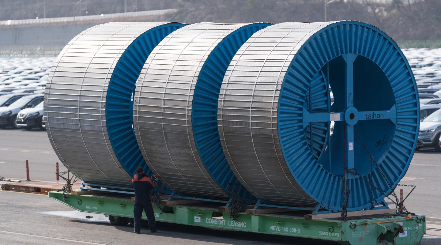 Taihan subsea cable drums on a roll trailer Taihan subsea cable drums on a roll trailer