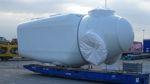 Nacelle from a wind turbine on a roll trailer